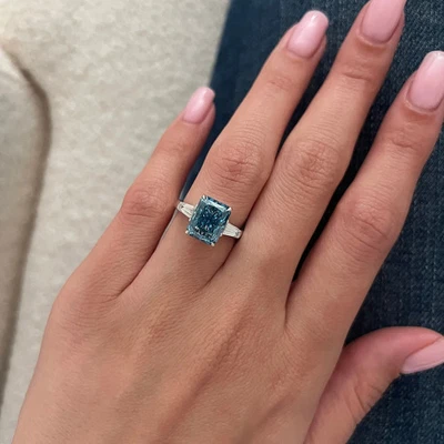 4.00 Carat Radiant Fancy Vivid Blue Lab Grown Diamond 3 Stone Engagement Ring - Image 1 of 4