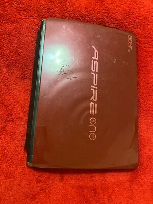 Portátil Aspire One Acer usado rojo necesita reparación (sin cargador) Foto 1 de 4
