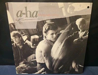 A-HA - HUNTING HIGH AND LOW - WARNER BROS RECORDS LP VINYL RECORD 1985 - Image 1 of 4