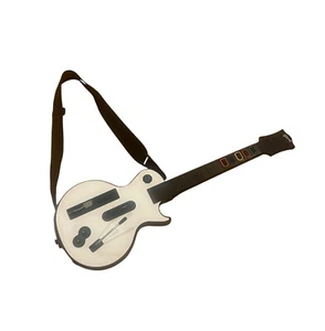 Nintendo Wii Guitar Hero Gibson Les Paul Red Octane con cinturino 95125.805 - Foto 1 di 7