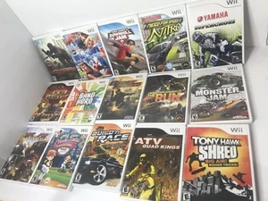 Console NINTENDO WII Bundle con SCATOLA 26 giochi con custodie e altro - Foto 1 di 17