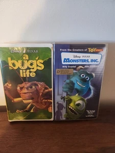 A Bugs Life And Monsters Inc Vhs Lot Pixar Movies Blue Tape - Picture 1 of 4