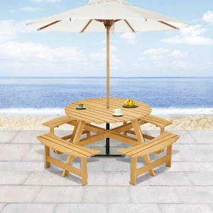 An 8-person outdoor round picnic table with 4 builtin benches and umbrella holes - Picture 1 of 18