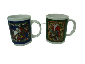 2 Stück Feinsteinzeug Becher Frohe Weihnachten Weihnachtsmann Drucke - Bild 1 von 7