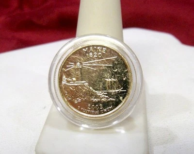 24KT GOLD PLATED US STATE QUARTER UNCIRCULATED MORGAN MINT IN CAPSULE MAINE 2003 - Image 1 of 4