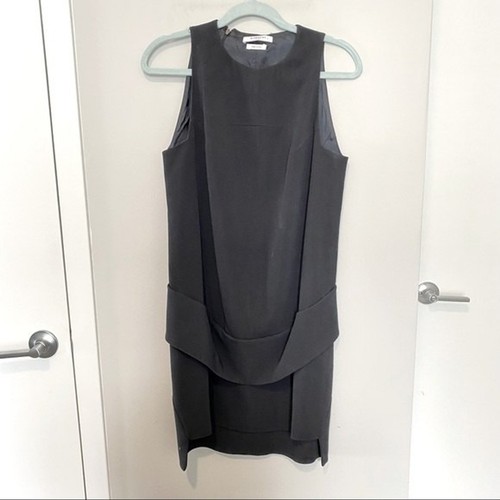 Abito tubino smanicato Givenchy Paris nero con volant peplo business professionale