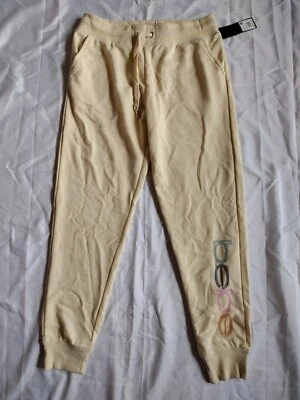 Joggers Bebe Talla:M Mujer Marfil Logo 60% Algodón Bolsillos Ligeros. Nuevo con etiquetas Foto 1 de 4