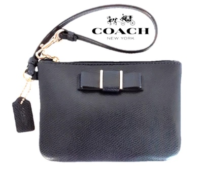 Muñequera estilo pajarita COACH en cuero grano cruzado azul medianoche dorado - original $129 Foto 1 de 4
