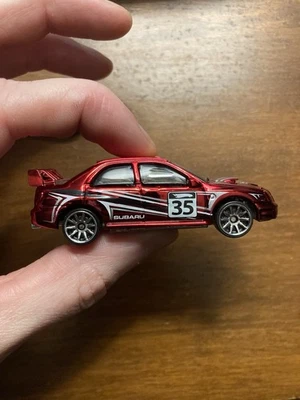 2008 Hot Wheels Race Aces Subaru Impreza Red Chrome Target Exclusive Loose - Image 1 of 3