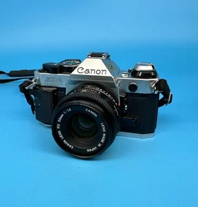 Canon AE-1 Program SLR Film Camera with Canon FD 50mm F/1.8 Lens - Picture 1 of 13
