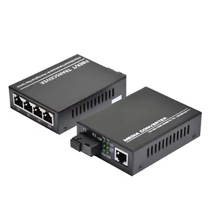 10/100/1000Mbps Single Mode 1&4 RJ45 Ethernet to Fiber Optic Media Converter - Picture 1 of 8