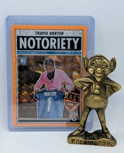 2025 Panini Mosaic - Travis Hunter Mosaic Orange Notoriety Prizm RC #12  - Picture 1 of 3