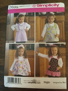 Simplicity pattern 2699 child apronsin sizes 1/2 to 4 uncut - Picture 1 of 1