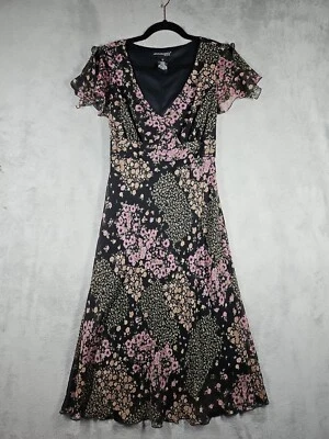 Vestido para mujer Jonathan Martin Studio negro con estampado floral forrado Flutter Slv talla 6 Foto 1 de 4