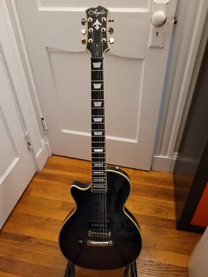 Agile AL-3100MCC Black electric guitar w/ case Wolfetone upgrade left handed - Image 1 of 4