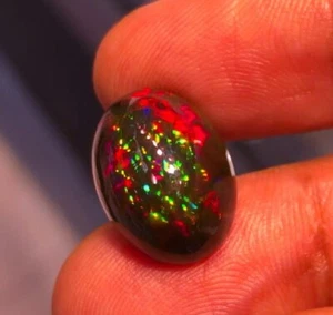 10.34CT UNIQUE HI END 100% NATURAL ETHIOPIA COLORPLAY BLACK OPAL - Picture 1 of 2