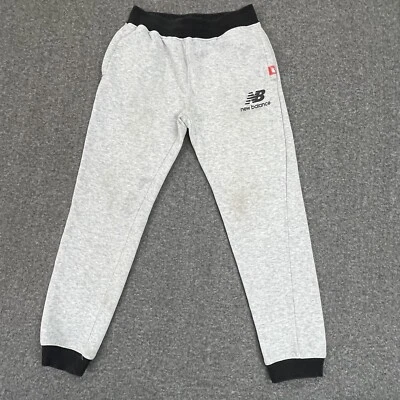 Pantalones deportivos New Balance Jogger para niños M (10-12) gris polar Foto 1 de 4