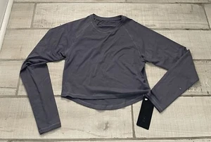 Nuevo con etiquetas Top corto Alphalete Stratus manga larga gris manga larga talla mediana - Imagen 1 de 7