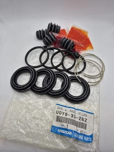 Mazda B2500 B2600 B1800 1996- Genuine Front Caliper Seal Repair Kit U0Y93326Z  - Imagen 1 de 8