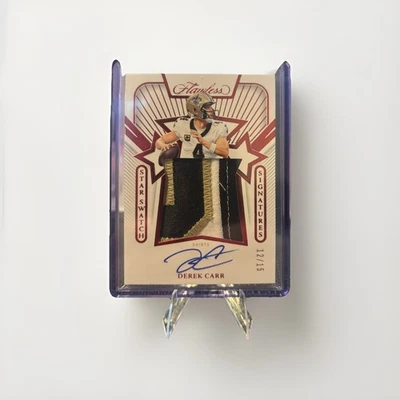 2024 Panini Flawless - Star Swatch Signatures Derek Carr #SS-DCR Ruby /15 Saints - Imagem 1 de 2