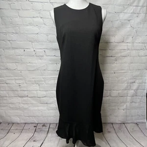 Donna Karan Black Crew Neck Ruffled Back Flounce Hem Dress Size 6 - Picture 1 of 8