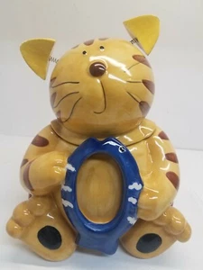 Tarro de galletas amarillo y naranja para gatitos con rayas de tigre y orejas cargadas con resorte. - Imagen 1 de 8