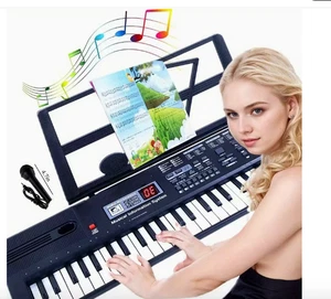 Microfono tastiera pianoforte digitale portatile 61 tasti 16 timbri e 8 percussioni suono - Foto 1 di 9