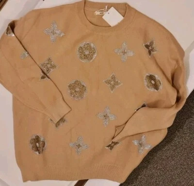 Suéter de lentejuelas para mujer tan delicado como un toque de cachemir Foto 1 de 3