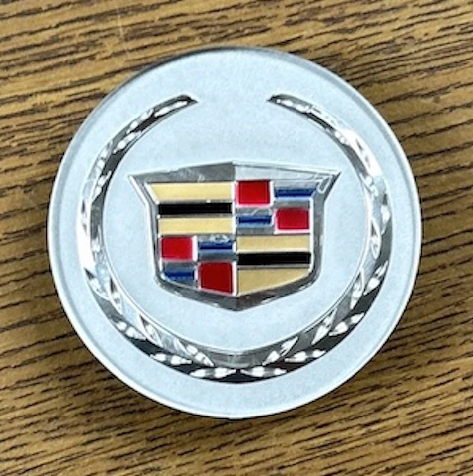 Tapa central individual 2 5/8" Cadillac ATS, CTS, DTS, SRX, STS, XLR, XTS #9596628 Foto 1 de 1