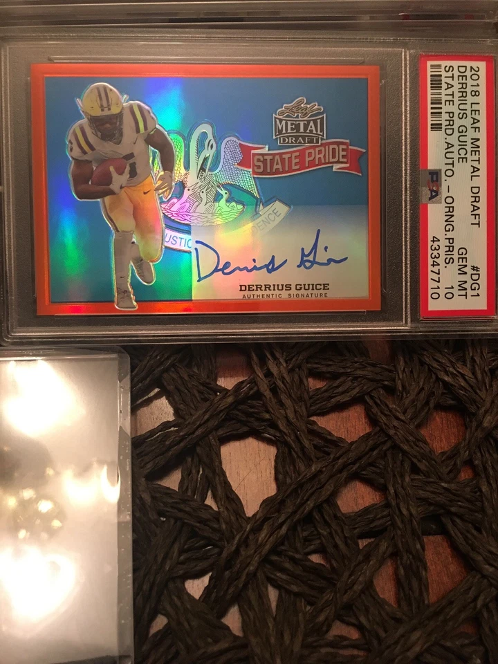 PSA 10 Gem Pop 1! 2018 DERRIUS GUICE SSP 7/7 LEAF STATE PRIDE METAL DRAFT AUTO - Image 1 of 4