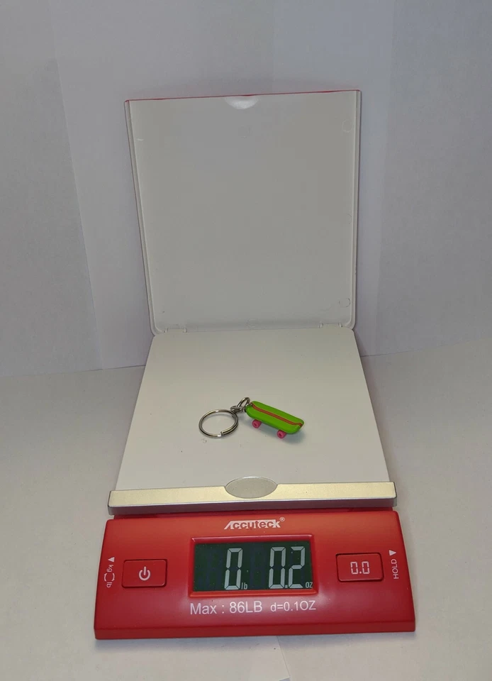 Kidrobot The Simpsons 25th Anniversary Key Chain Skateboard - Image 1 of 1