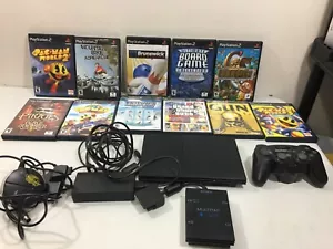 CONSOLE PS2 SLIM CON ALLEGATI GIOCHI 16 PC TESTATA FUNZIONANTE - Foto 1 di 15