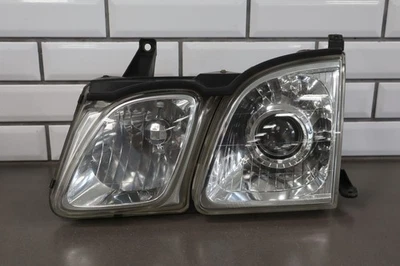98-02 Lexus LX470 lâmpada de cabeça esquerda para motorista (sem acabamento de enchimento) - Imagem 1 de 4