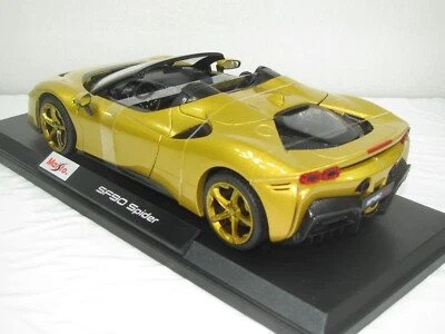 FERRARI SPIDER SF90 МЕТАЛЛИЧЕСКИЙ ЗОЛОТОЙ НОВЫЙ В КОРОБКЕ 1:18. - Изображение 1 из 4