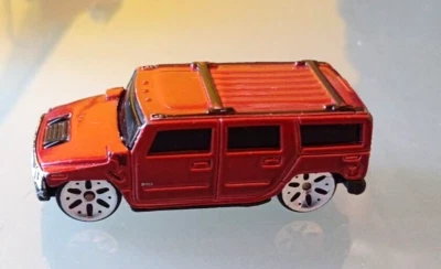 Maisto Hummer H2 Rosso 1:64 - Immagine 1 di 4