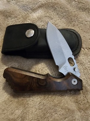 (RARO) CUCHILLO BUCK 889 STRIDER MANGO IRONWOOD. 1/50 0889B01-B firmado por CJ Buck Foto 1 de 4