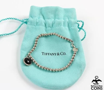 Pulsera Tiffany & Co. de plata esterlina pequeña con cuentas de 6" y dije de ónix con bolsa Foto 1 de 4