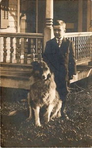 Little Boy Named Leonard Poses In Suit With His Dog Early 1900's RPPC - Picture 1 of 2