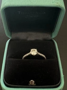 Tiffany & Co. Diamond .54 Carat Novo Round Engagement Ring with Pave Band - Picture 1 of 3
