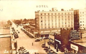 Postal de autos antiguos La Grande O Street View Storefronts RPPC - Imagen 1 de 1