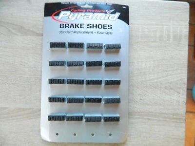 20 zapatas de freno de bicicleta vintage NOS en letrero de cartón de tienda Foto 1 de 3