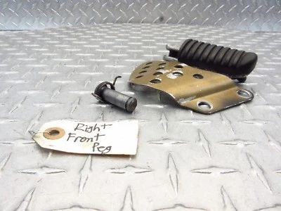 2000 00-02 05-07 Kawasaki ZX600J1 ZX600 ZX6R ZZR600 CLAVIJA DELANTERA DERECHA SOPORTE PIE Foto 1 de 4