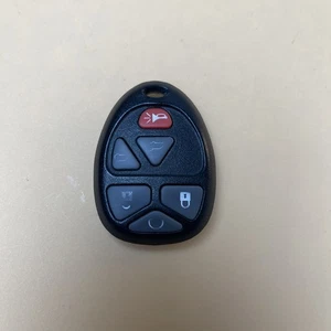 ORIGINAL GMC CHEVROLET CADILLAC 07-13 OEM KEY LESS ENTRY REMOTE FOB GM ALARM SUV - Foto 1 di 5