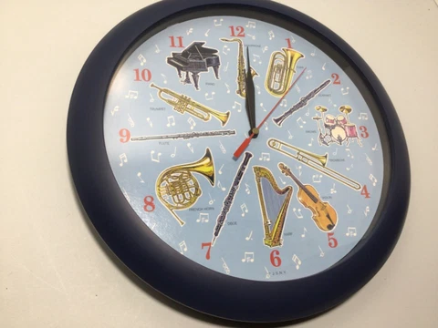 VTG Teltime ? Musical Instrument Clock On The Hour Music Day Night Sensor Blue Cover