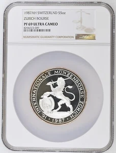 1987 SWITZERLAND 5 UNZEN 5oz SILVER PROOF ZURICH LION MUNZEN BORSE NGC PF 69 UC - Picture 1 of 2