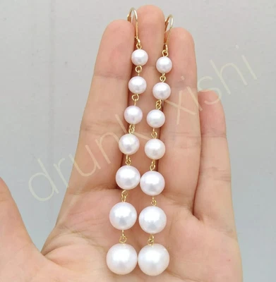 Impresionantes pendientes largos redondos de perlas blancas Akoya AAA+ reales de 4-10 mm de oro de 14 k P Foto 1 de 4