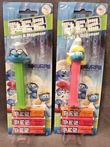 2 Vintage Smurf PEZ Dispensers Brainy Smurf & Smurfette New on Card - Picture 1 of 4