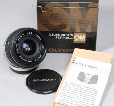 SUPER LIMPIO OLYMPUS OM G-ZUIKO 28MM F/3.5 EN LA CAJA CON ESTUCHE Y PAPEL VIDRIO LIMPIO Foto 1 de 4