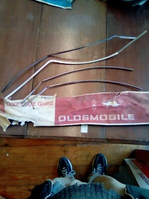 NOS 1967 OLDSMOBILE DELMONT DELTA 88 ACCESSORY 4 DOOR EDGE GUARDS 982631 - Image 1 of 4