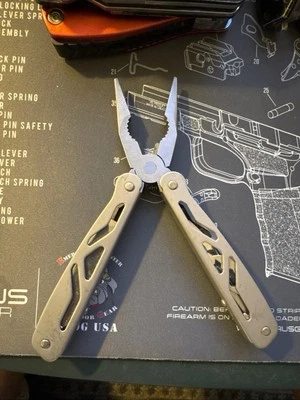 OZARK TRAIL Multi-Tool, Pocket Knife Tool Kit, Twelve In One No Sheath - Image 1 of 4